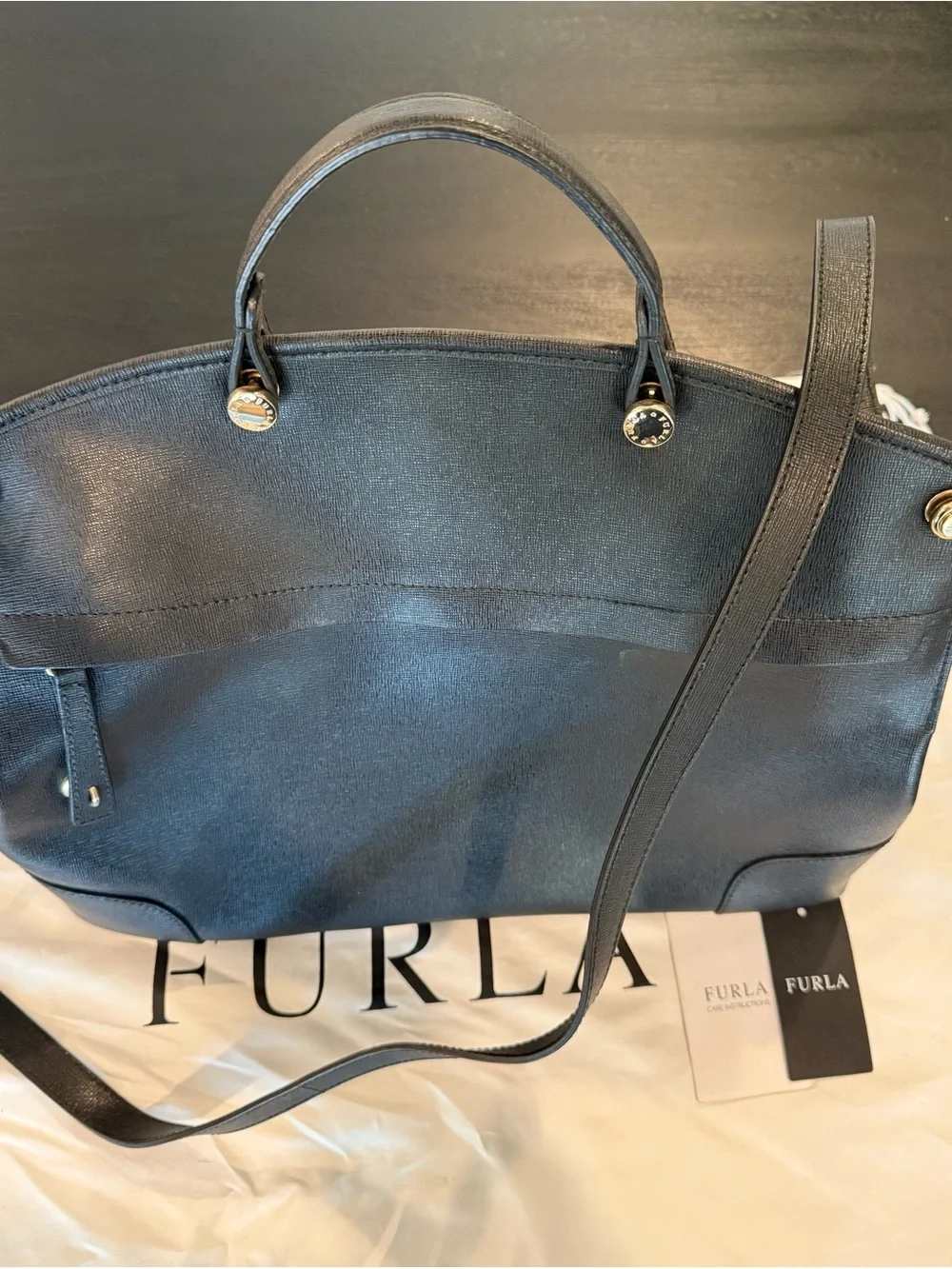 Furla downsizing figured